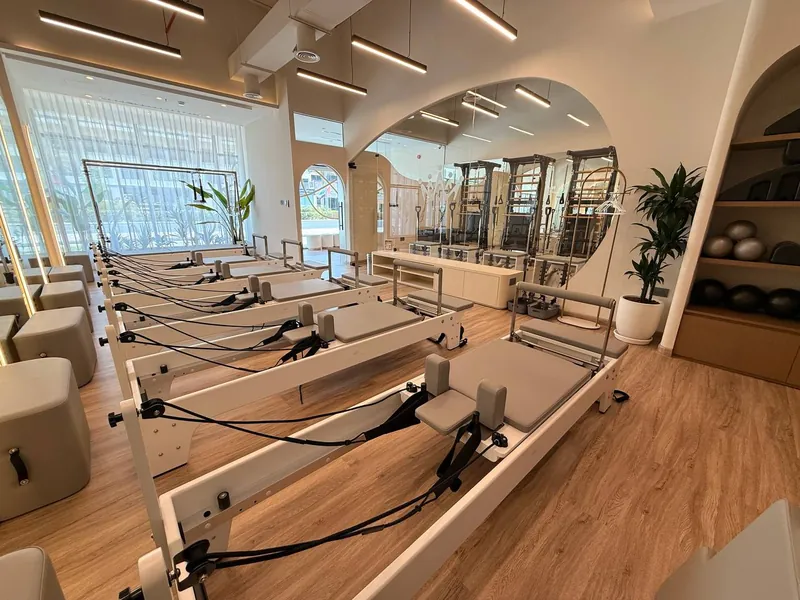 Inside Pilates Academy Arjan, reformers by the window